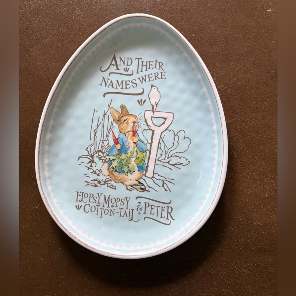 Melamine egg shaped plastic Beatrix potter plates. Pottery Barn.